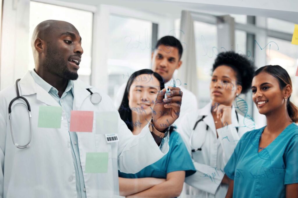 Doctor leading a medical team, implementing new DEI practices in the healthcare industry with change management training.